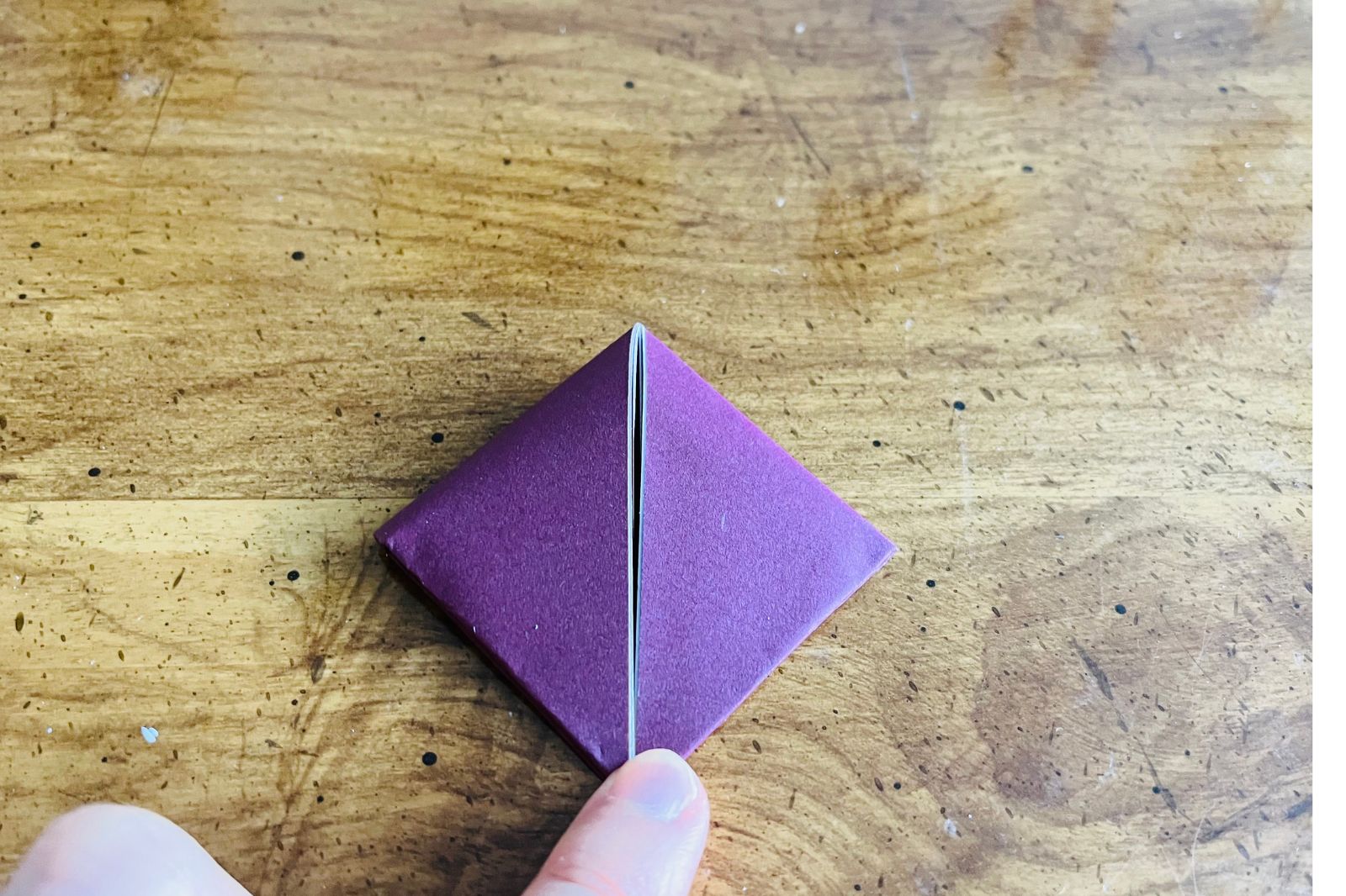 origami heart being folded